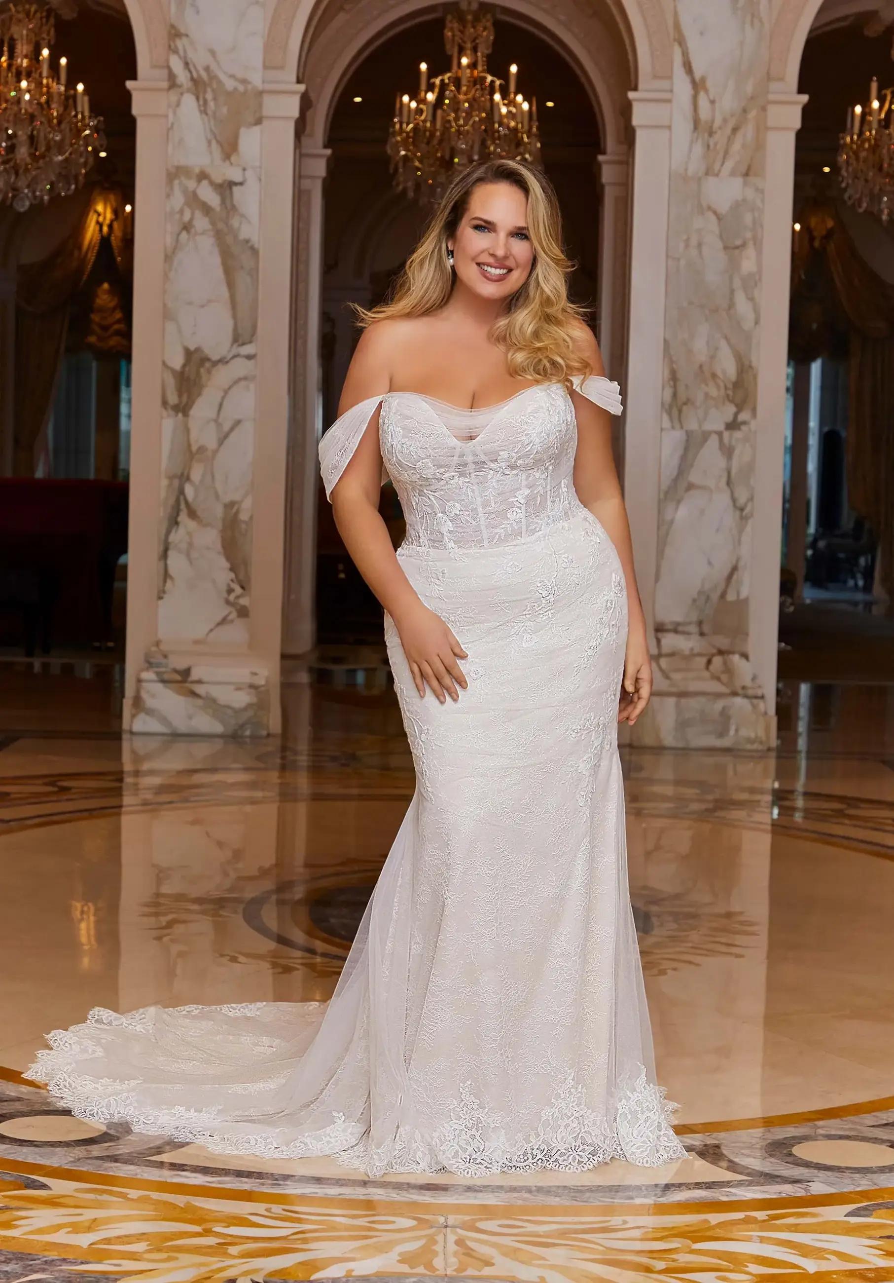 Model wearing a Plus Size gown