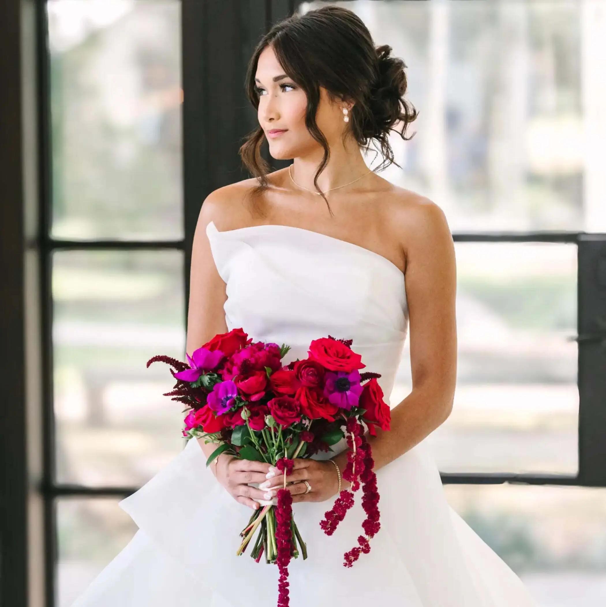 Photo of the model wearing a white bridal gown