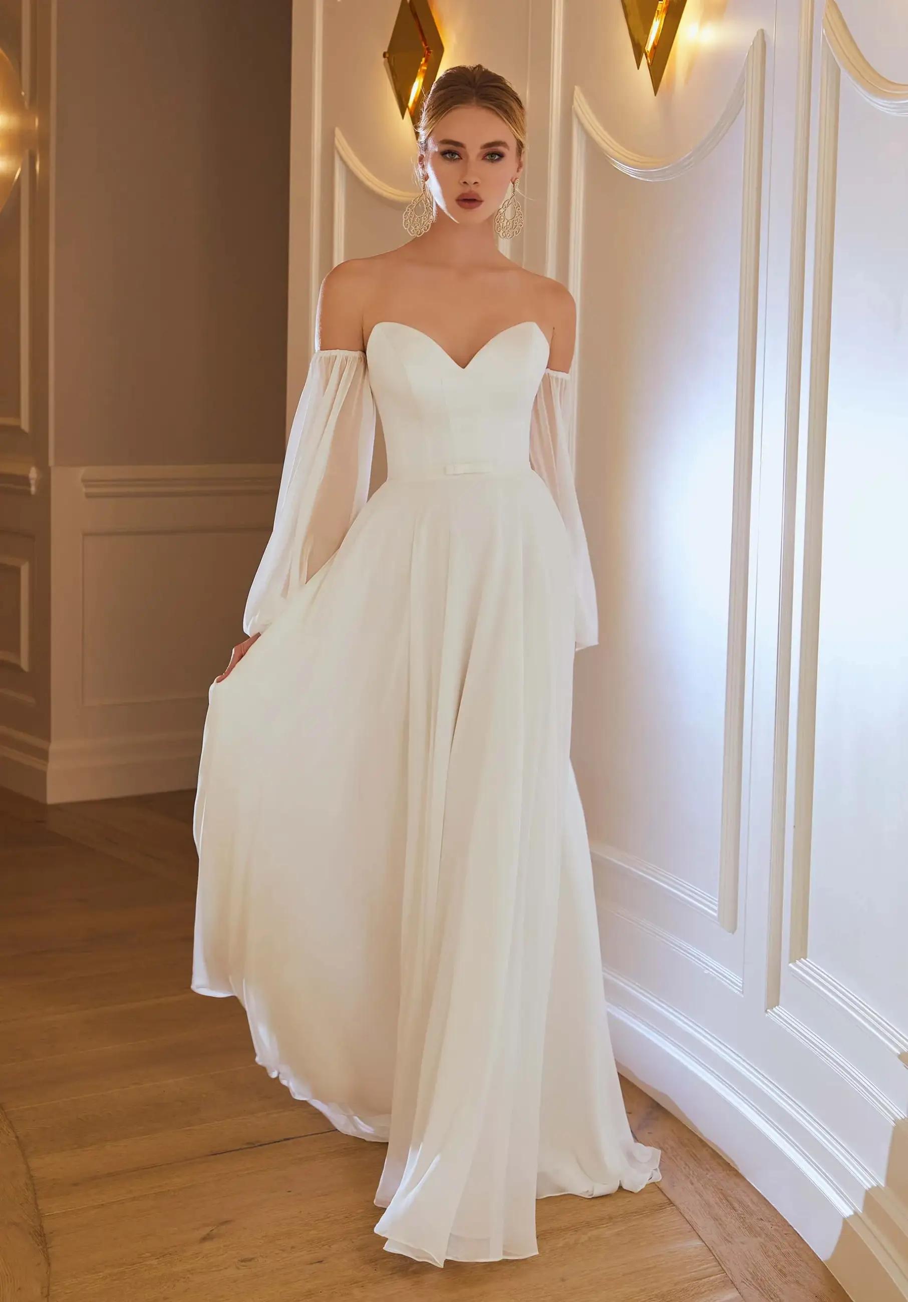 Behind the Seams: A Closer Look at the Wedding Dress Alteration Process Image