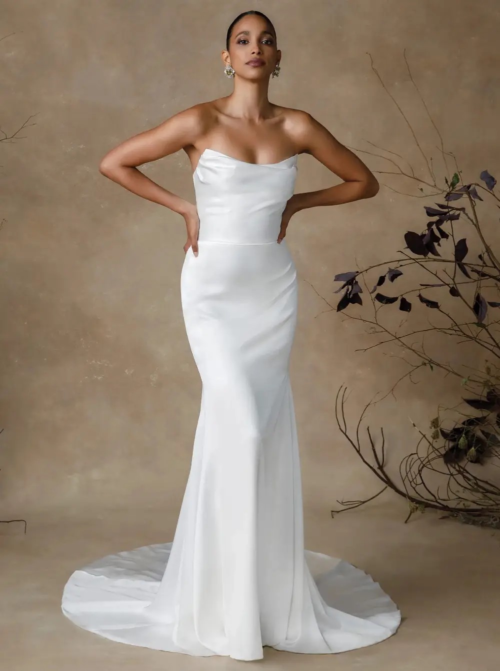 Model wearing a Strapless gown