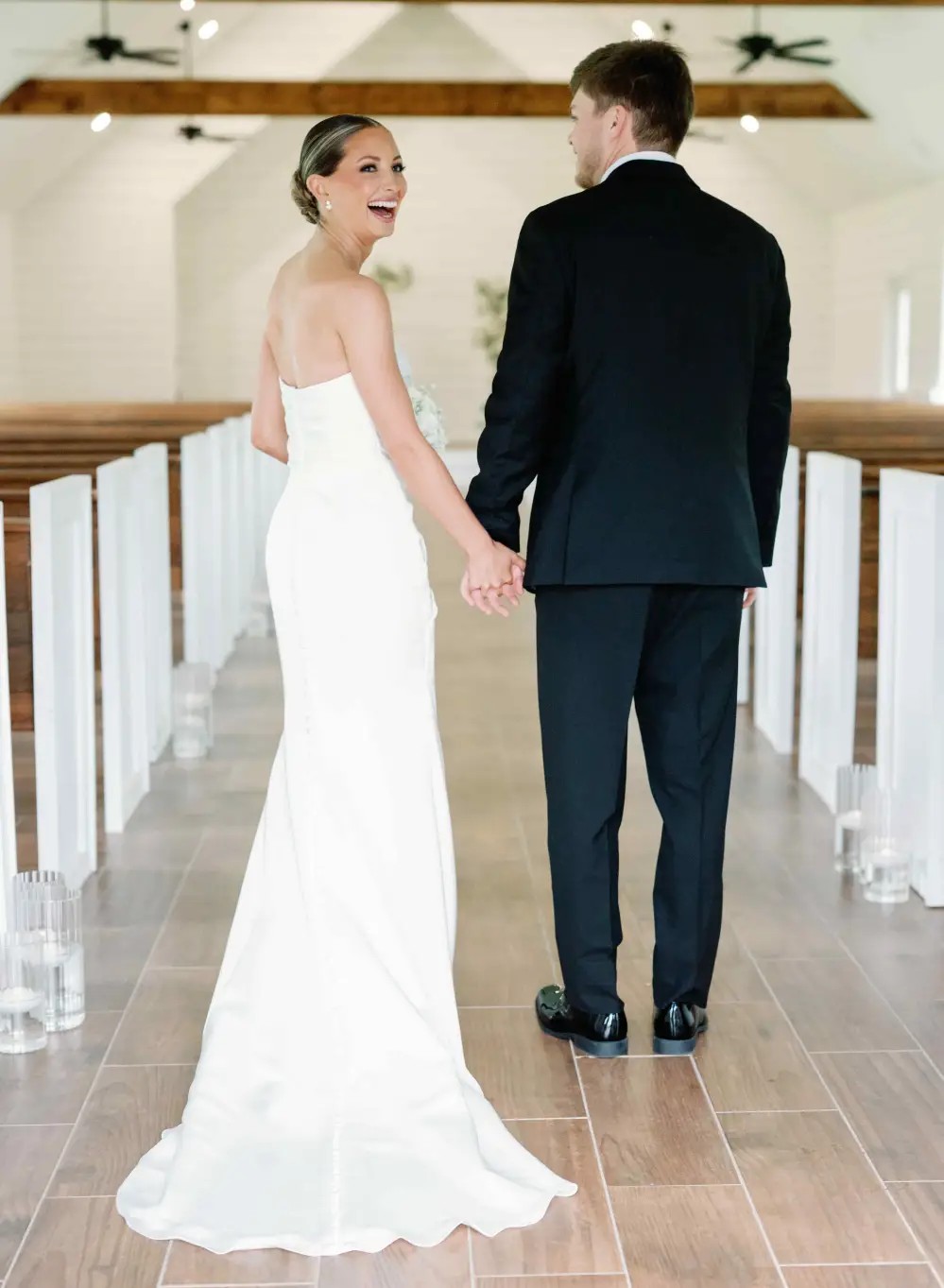 Photo of the model wearing a white bridal gown